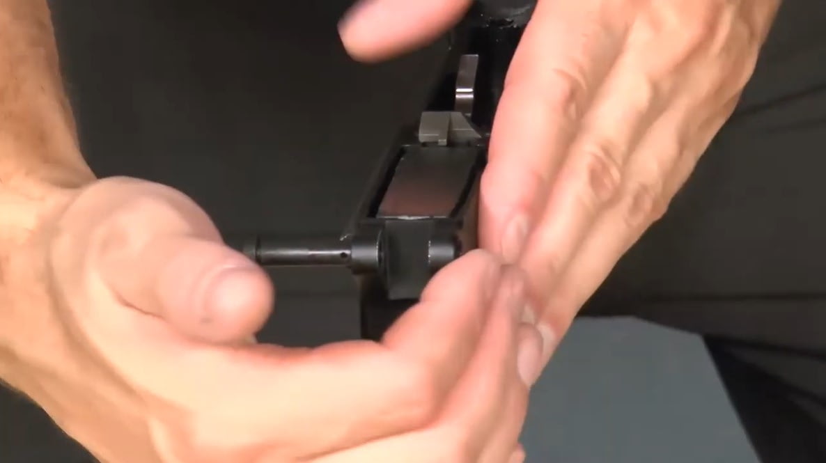 installing the front takedown pin on an ar15