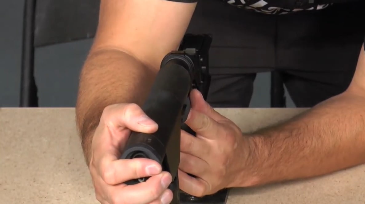 installing the rear takedown pin and stock on an ar15