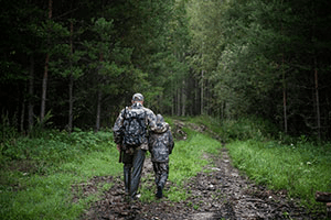 Man and Child Going Out to Hunt