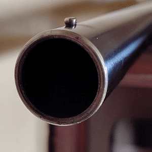 Fixed Full Cylinder Choke on a Shotgun