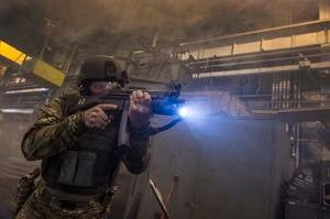 Operator Holding MP5 w/ Weapon Light