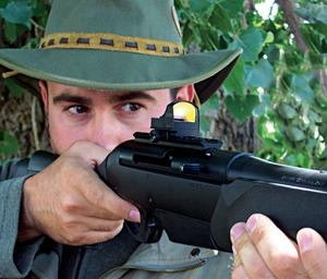 Man Aiming With Burris SpeedBead Red Dot Sight